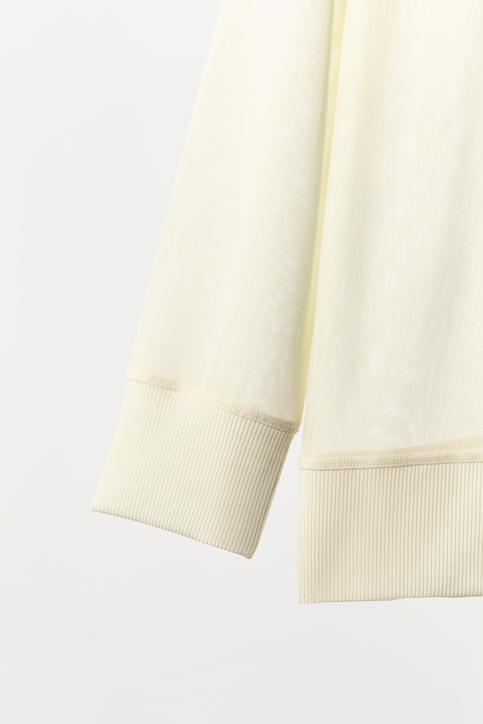 SWEAT FLUIDE SEMI-TRANSPARENT